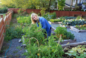 lady gardener working in her garden beds